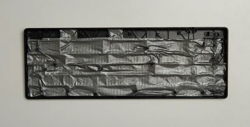 A layer of duct tape on the coins