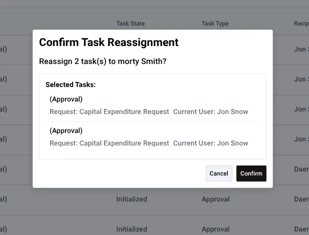 Reassignment confirmation dialog showing progress feedback and status of task reassignment operation